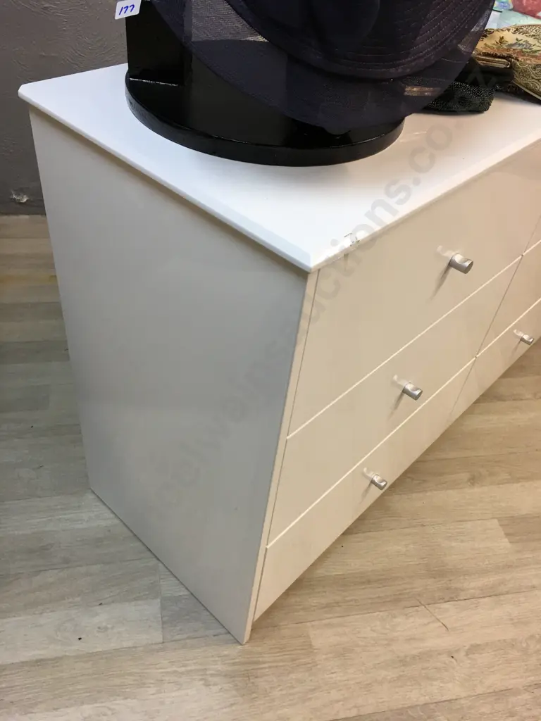 White Lacquered Six Drawer Lowboy With Silver Coloured Knobs H72,W114,D40cm. Image 1++